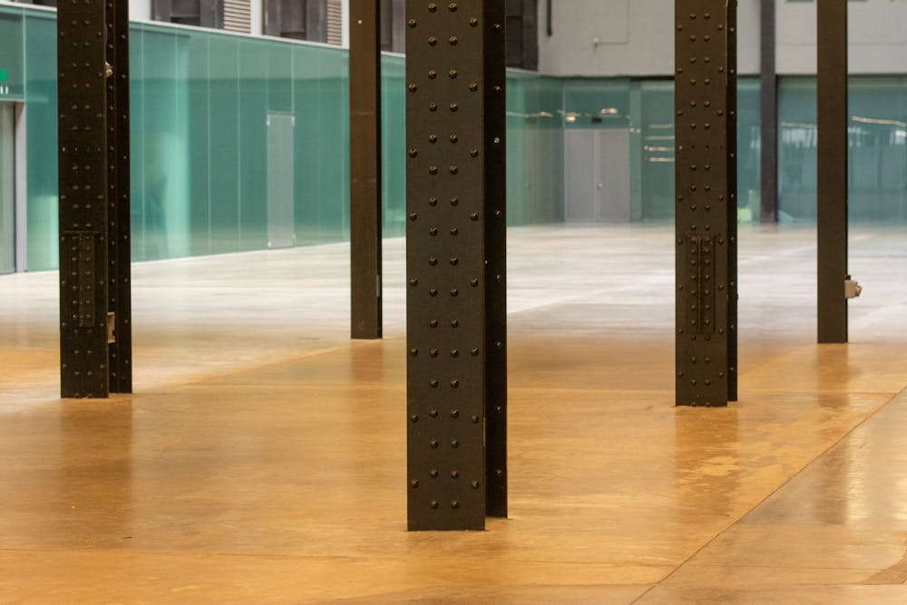 Modern industrial space with reflective polyaspartic floor coating